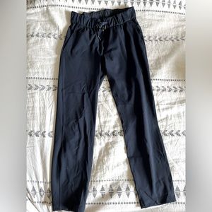 Navy lululemon on the fly 7/8 pants, size 4